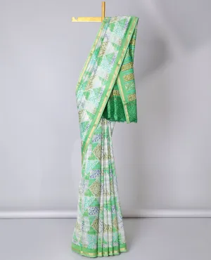Green geometric printed cotton saree, zari border & geometric printed pallu